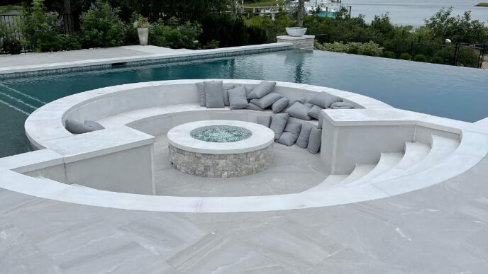 hardscape outdoor seating area by a pool